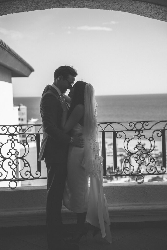 couple embraces together at Mexico destination wedding