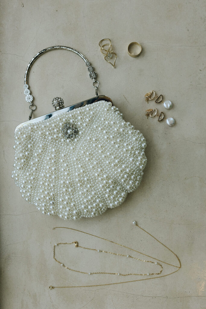 pearl-studded purse and jewelry for wedding