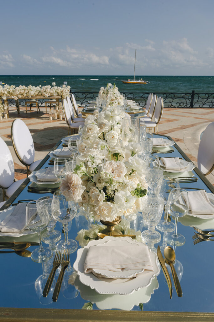 white floral decor on wedding reception table