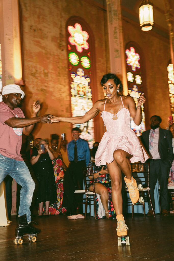 bride dances wearing roller skates at Hotel Peter and Paul New Orleans wedding