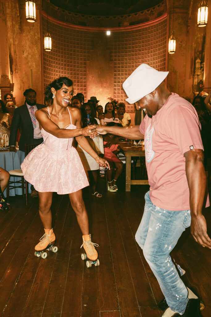 bride dances wearing roller skates at Hotel Peter and Paul New Orleans wedding