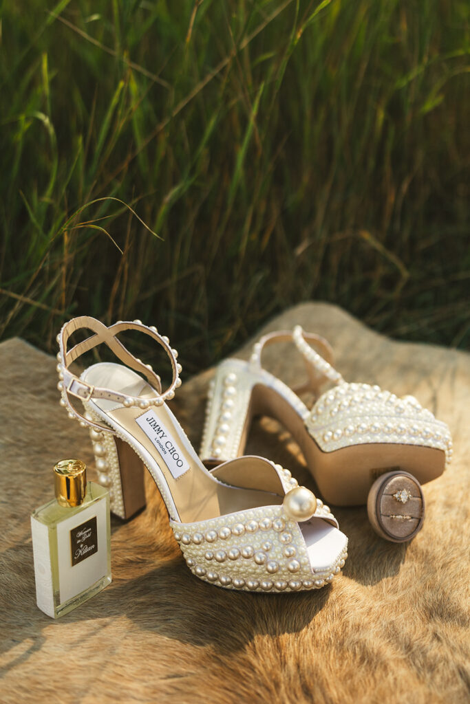 pearl-studded wedding shoes wedding perfume and rings 