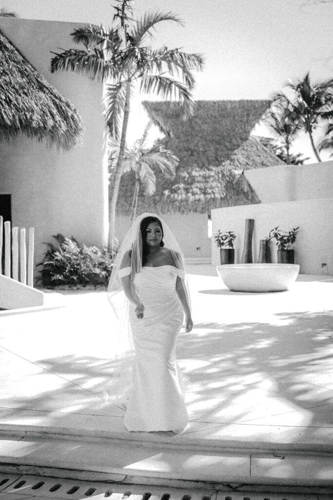 bride walks along wedding venue at Dominican Republic destination wedding 