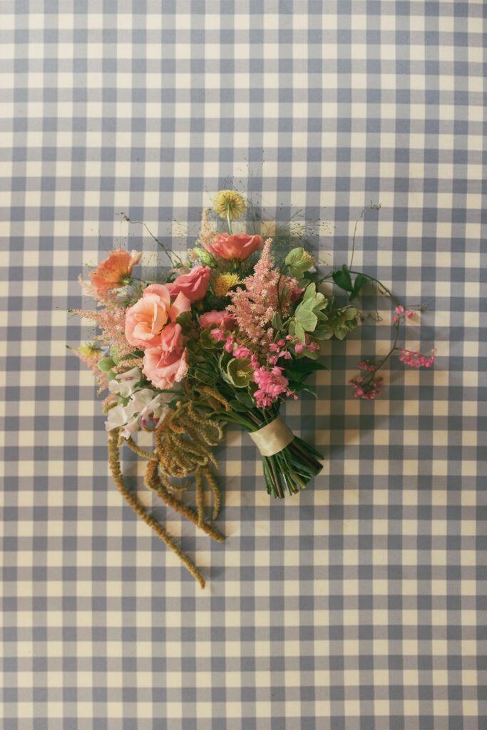 wildflower wedding bouquet on tablecloth 