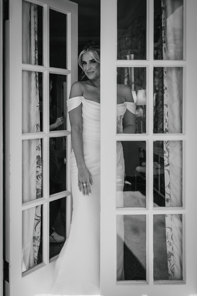 bride opens door for first look at The Duke Mansion Charlotte
