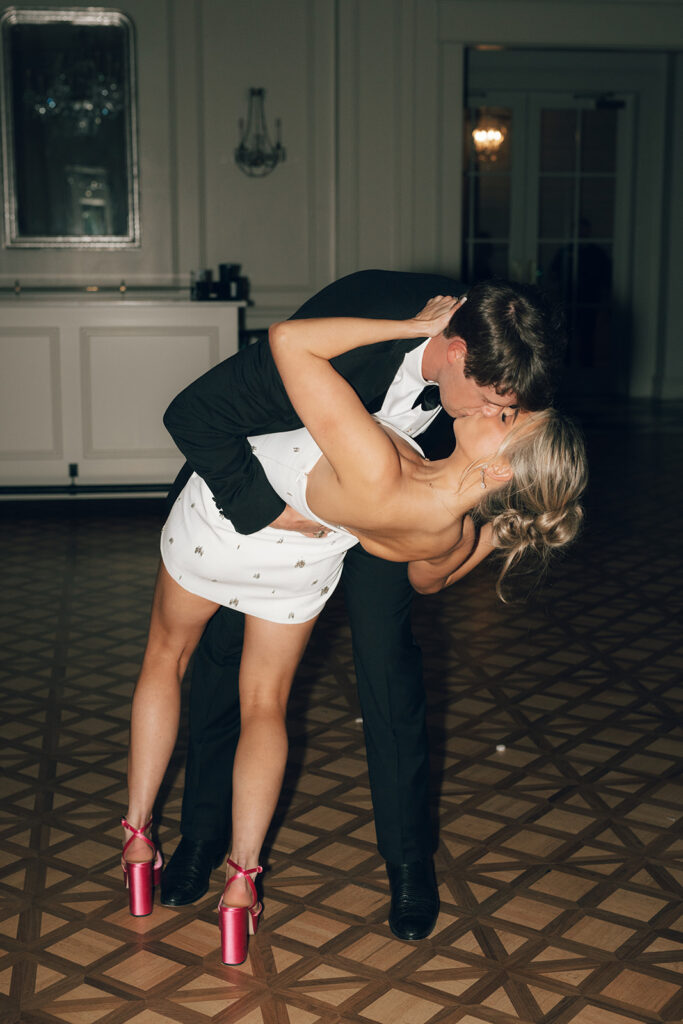 couple kisses during wedding reception last dance 